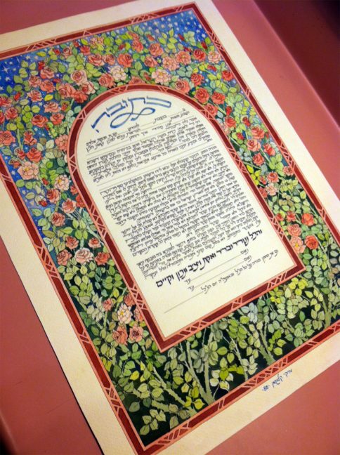 Roses Original Ketubah by Mickie Caspi, with sample orthodox wedding texthand in calligraphy